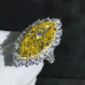 Luxury 10-carat marquise cut yellow gemstone ring with 3EX sparkle and silver band