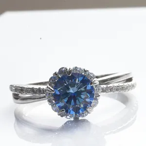 925 silver ring featuring 1 carat blue moissanite in double cross band with halo setting