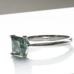 925 sterling silver ring with princess cut green moissanite in four-prong setting