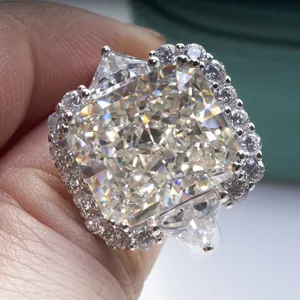 Macro detail of high-carbon yellow radiant cut diamond ring with 925 silver setting
