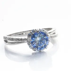 S925 sterling silver ring featuring a round brilliant blue moissanite with halo setting