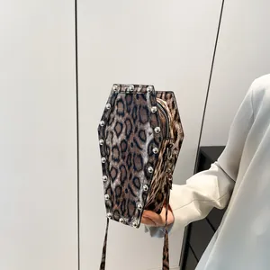 Gothic coffin-shaped shoulder bag with leopard print and silver metal rivets on PU leather