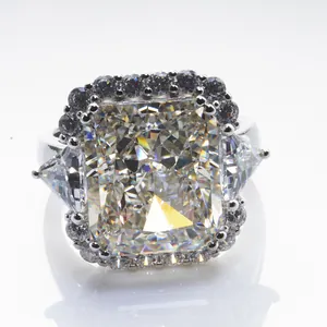 Radiant cut 10ct yellow high carbon diamond ring with side stones in white gold setting