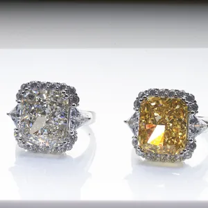 Macro detail of radiant cut high carbon diamonds in halo setting with trillion side stones