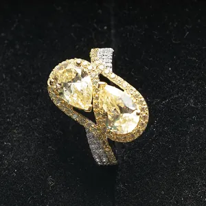 Luxury S925 silver ring with teardrop yellow carbon diamond and waved pavé band