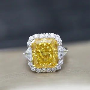 Detailed close-up of a 10ct radiant cut yellow diamond ring in silver setting
