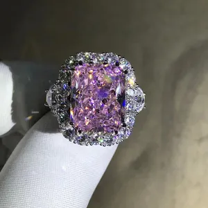 Macro view of 10-carat radiant cut pink high carbon diamond ring on white glove