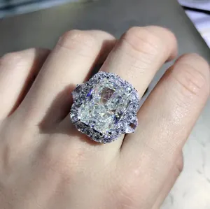 Close-up of a luxury radiant cut high carbon diamond ring with a halo and pave setting