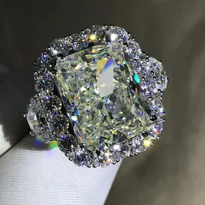 Macro view of a luxurious Radiant-cut high-carbon pink diamond ring with halo setting