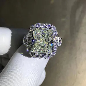Macro view of a 10ct radiant cut pink simulated diamond ring with halo stones