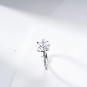 2ct oval cut D color VVS moissanite ring with side stones on polished silver band