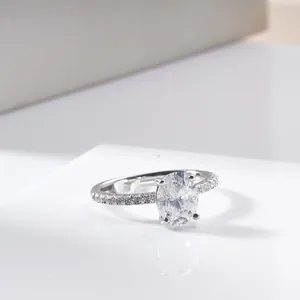 2ct oval cut white moissanite ring in 925 silver with hidden halo and side stones