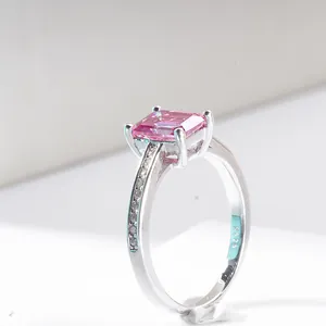 Macro shot of S925 sterling silver ring featuring a radiant cut pink moissanite stone