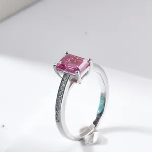 Macro shot of S925 silver ring featuring a radiant cut pink gemstone and four-prong setting