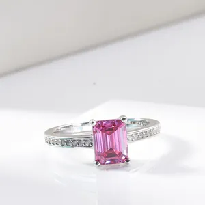 S925 sterling silver ring featuring a radiant cut pink emerald moissanite and side stones