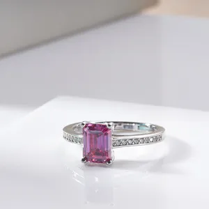 Detail of s925 silver ring featuring radiant cut pink gemstone with pave diamonds