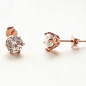 Rose gold six-prong S925 sterling silver stud earrings featuring round pink moissanite stones