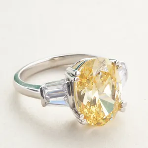 Elegant 6-carat oval yellow stone ring with side baguette accents in silver finish