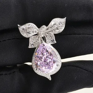 Elegant bowknot silver pendant with 10ct pear-cut pink carbon diamond in micro-pave setting