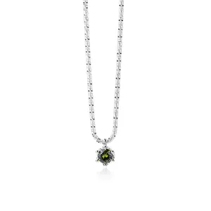 Detail of 925 silver necklace with green round-cut moissanite pendant in six-prong setting