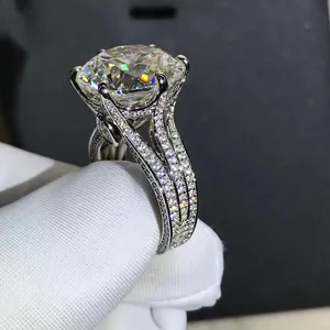 Macro detail of a 12ct round brilliant cut diamond ring with multi-row pavé setting
