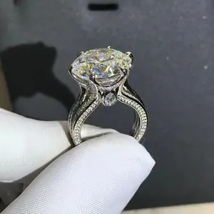 Macro detail of 12ct round cut diamond ring with pavé split shank in silver setting