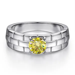 Detailed close-up of S925 silver ring band with grid pattern and yellow moissanite