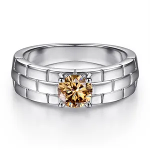 Detail of 5mm moissanite ring with watch band texture and polished sterling silver band