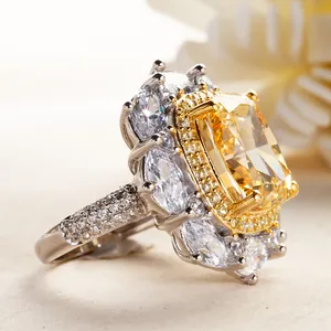 Luxury sterling silver ring with 8ct yellow radiant cut diamond and marquise halo