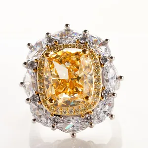 Luxury 8-carat yellow cushion-cut diamond ring with marquise petals on white background