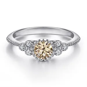 Macro view of 0.5ct champagne moissanite ring in S925 silver with halo side stones