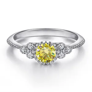 Detailed view of s925 silver ring with 0.5ct yellow moissanite and cluster diamonds