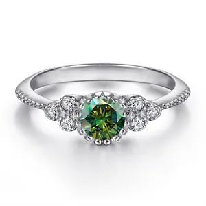 Top view of S925 silver ring featuring a 0.5ct green moissanite with halo setting