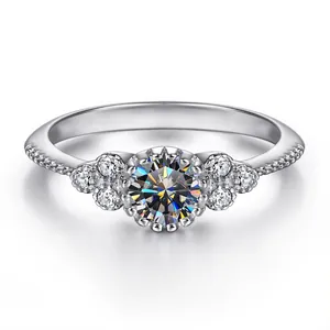 Classic S925 sterling silver ring featuring a round moissanite center stone and side accents