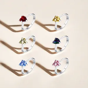925 silver rings with heart-shaped colorful moissanite stones in various vibrant colors