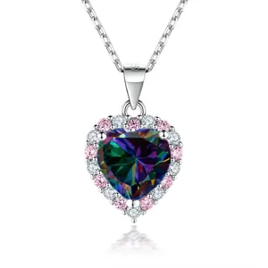 Macro shot of 2ct heart-shaped mystic topaz pendant with colorful halo and silver chain