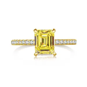 2ct emerald cut pink moissanite sterling silver ring with pavé diamonds and reflection