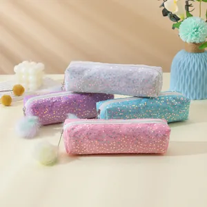 Sparkly sequin pencil cases in rainbow colors with soft pompom charms for students