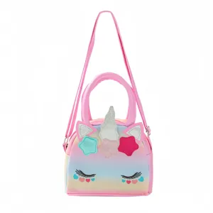 Detail of cute unicorn crossbody bag featuring pink gradient TPU and sequin horn detail