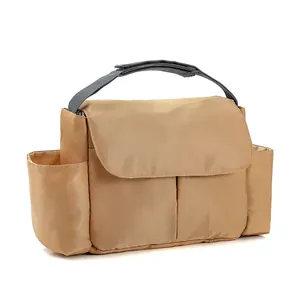 Portable khaki diaper organizer bag with grey straps and large capacity storage compartments