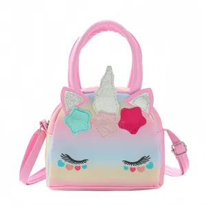 Detail of pink unicorn kids crossbody bag with glitter horn and rainbow sequins