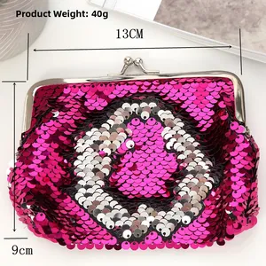 Macro shot of a 13x9cm sequin coin purse with a metal clasp and pink heart pattern