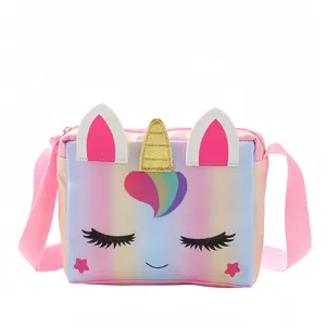 Detail view of unicorn crossbody bag with glitter horn and rainbow heart patch