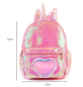 Pink sequin unicorn backpack showing height dimensions of 34cm and width of 24cm