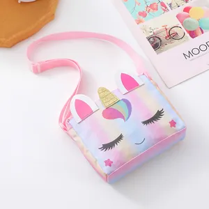 Detailed view of rainbow sequin unicorn crossbody bag with glitter horn and adjustable strap