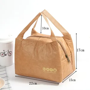 Detailed dimensions of brown insulated lunch bag with food icons and top handles