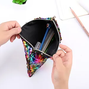 Detailed view of mermaid sequin pouch with gold zipper and multi-use storage capacity