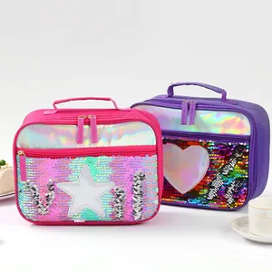 Detail of sequin lunch bags with reversible heart patterns and dual zipper closure