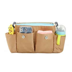 Detailed view of diaper bag organizer with compartments for bottles and accessories