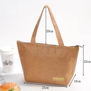 Detail of insulated brown kraft paper lunch bag with dimensions and sturdy handles
